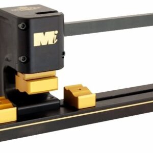 a black and gold metal machine with a handle